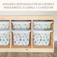 Load image into Gallery viewer, a wooden storage unit with multiple compartments, each containing a white plastic bin with a star pattern design. The storage unit has a light-colored wooden frame and appears to be made of wood.