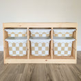 Load image into Gallery viewer, A wooden shelf with six white and tan checkered storage bins arranged in two rows of three.