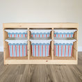 Load image into Gallery viewer, A wooden shelf with six storage bins on it, each with a pattern of red, white, and blue stripes.