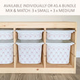 Load image into Gallery viewer, a wooden storage unit with multiple white plastic bins arranged on it. The bins have a pink and white patterned design.