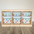 Load image into Gallery viewer, A wooden shelf with six colorful storage bins arranged on it.