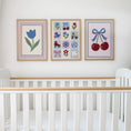 Load image into Gallery viewer, Cherry and floral print set displayed above a cot