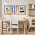 Load image into Gallery viewer, Cherry and tulip prints above a children's play kitchen