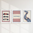 Load image into Gallery viewer, Set of three prints showing racing cars, checkerboard name print and winding race track, white frames display