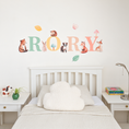 Load image into Gallery viewer, Full display of personalised name fabric wall stickers featuring multicoloured letters with woodland animals and leaves