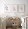 Load image into Gallery viewer, Pink Boho Unicorn Nursery Wall Art | Set of 3 | Rainbow, Sun, and Moon Prints for Girls' Bedroom - RoseRowanDesign -