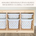 Load image into Gallery viewer, a wooden shelf with multiple white storage bins arranged on it. The bins have a floral pattern and are designed to hold small items. The shelf appears to be made of wood and has a simple, functional design.
