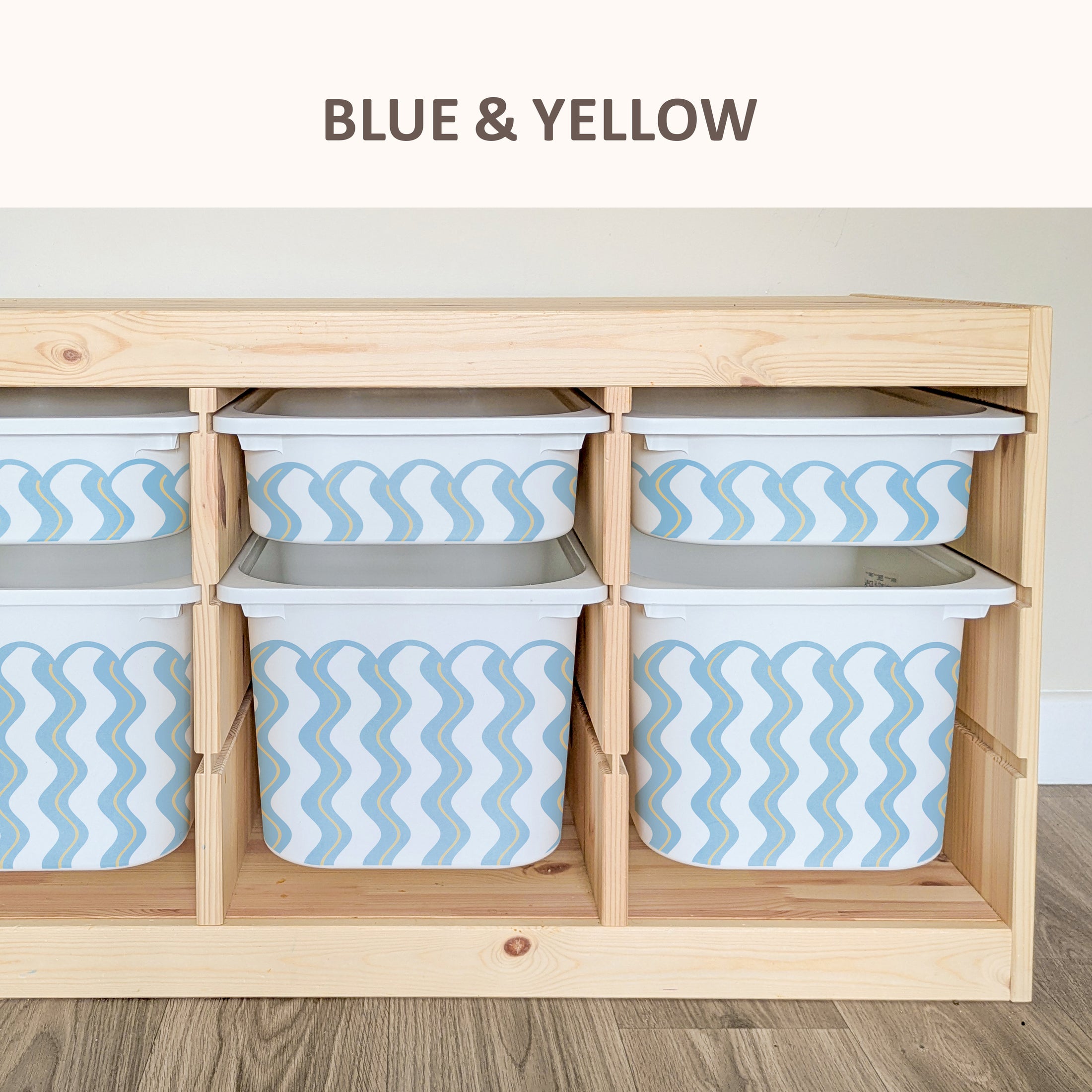 A wooden shelf with multiple storage bins, divided into two sections, one blue and one yellow.