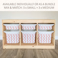 Load image into Gallery viewer, a wooden storage unit with six compartments, each containing a white plastic bin with a pink and white striped pattern. The storage unit appears to be made of wood and has a simple, functional design.
