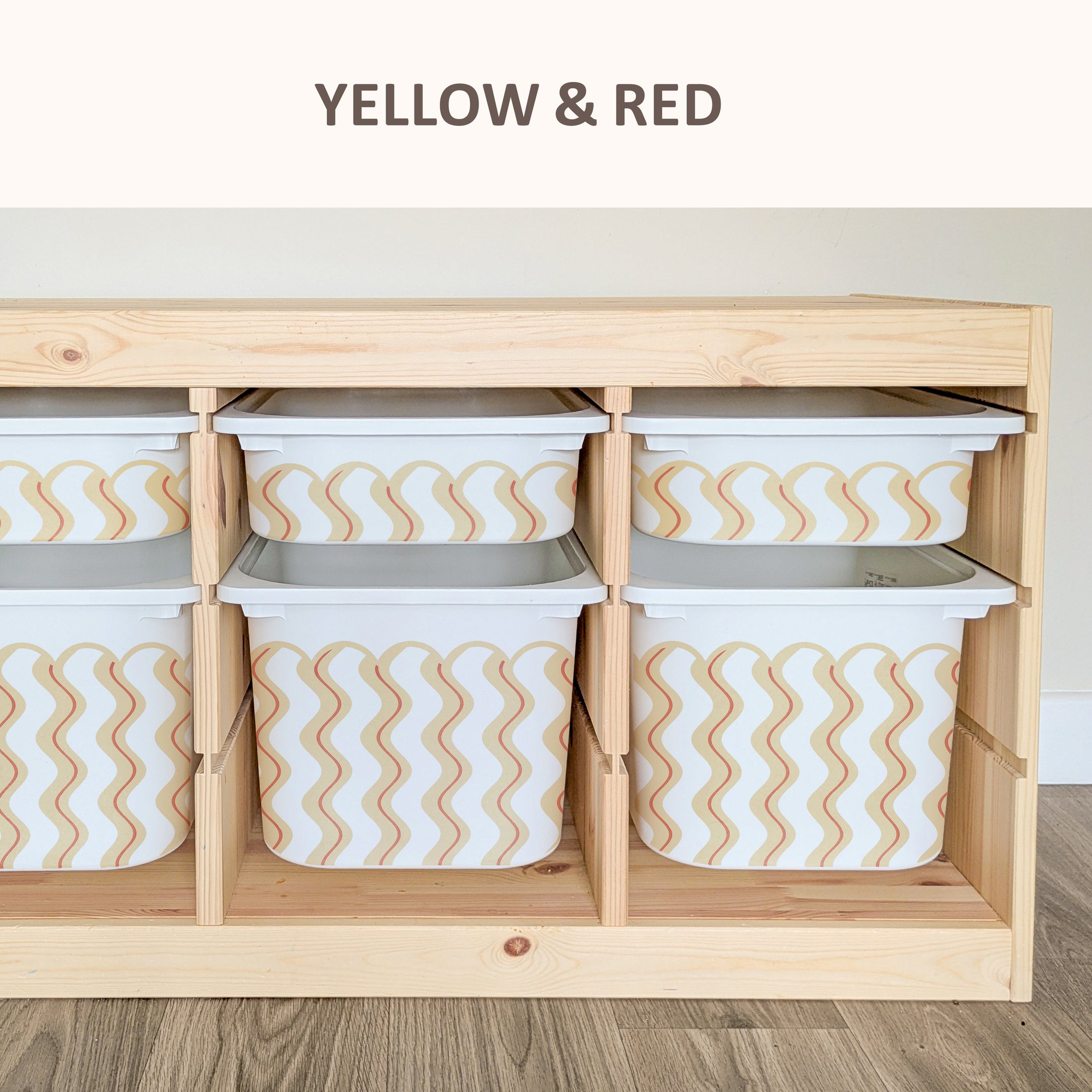 A wooden storage unit with multiple compartments, each containing a white plastic bin with a yellow and red striped pattern.