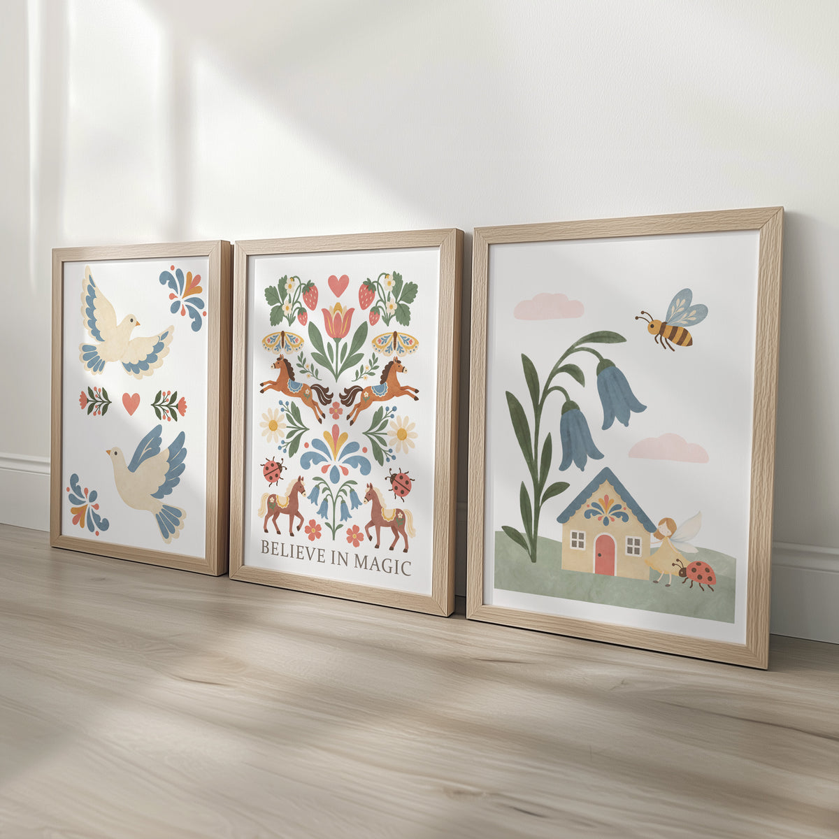 Folk art nursery print set featuring doves, Believe in Magic horses and a fairy cottage