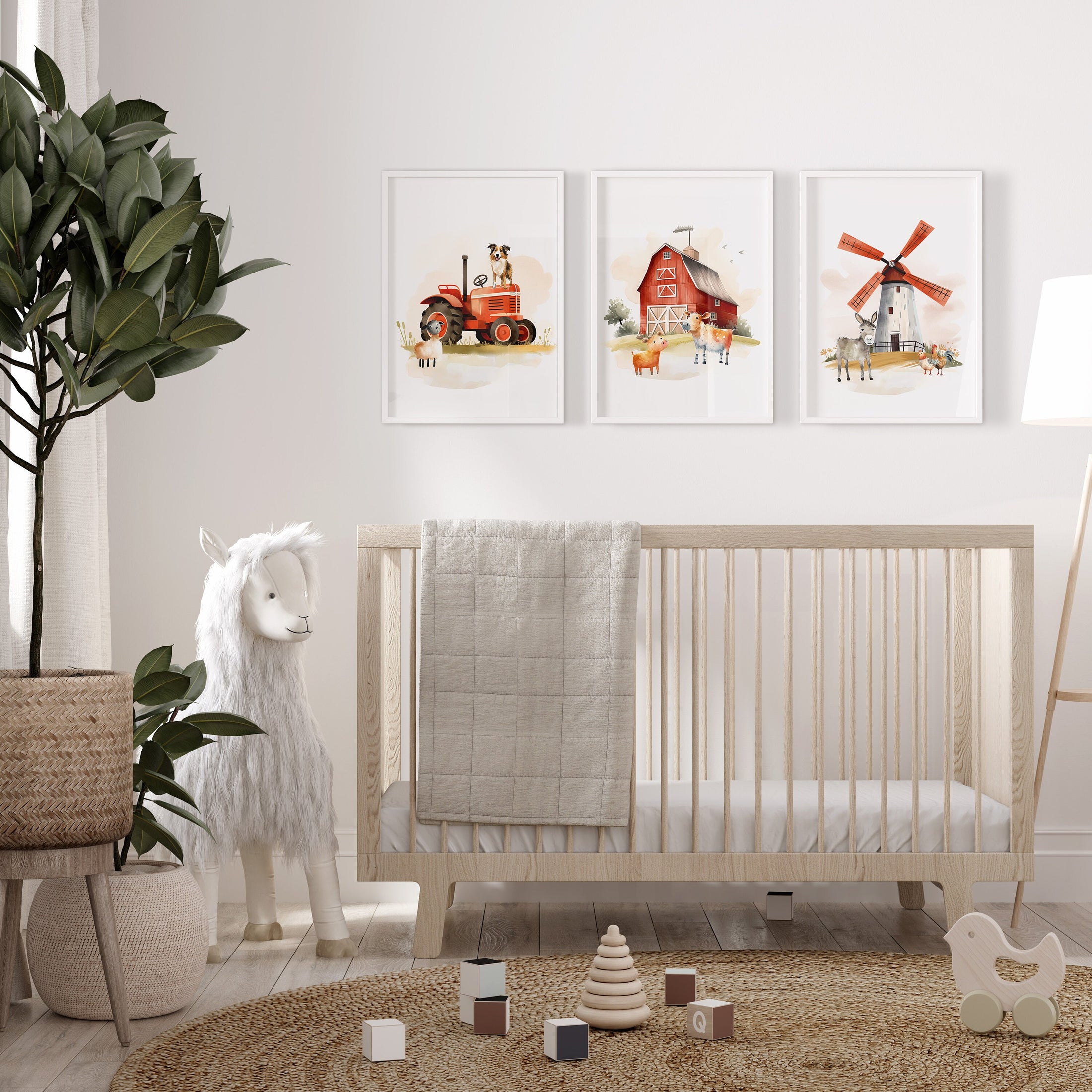 a baby&#39;s room with a crib, rocking horse, and three paintings