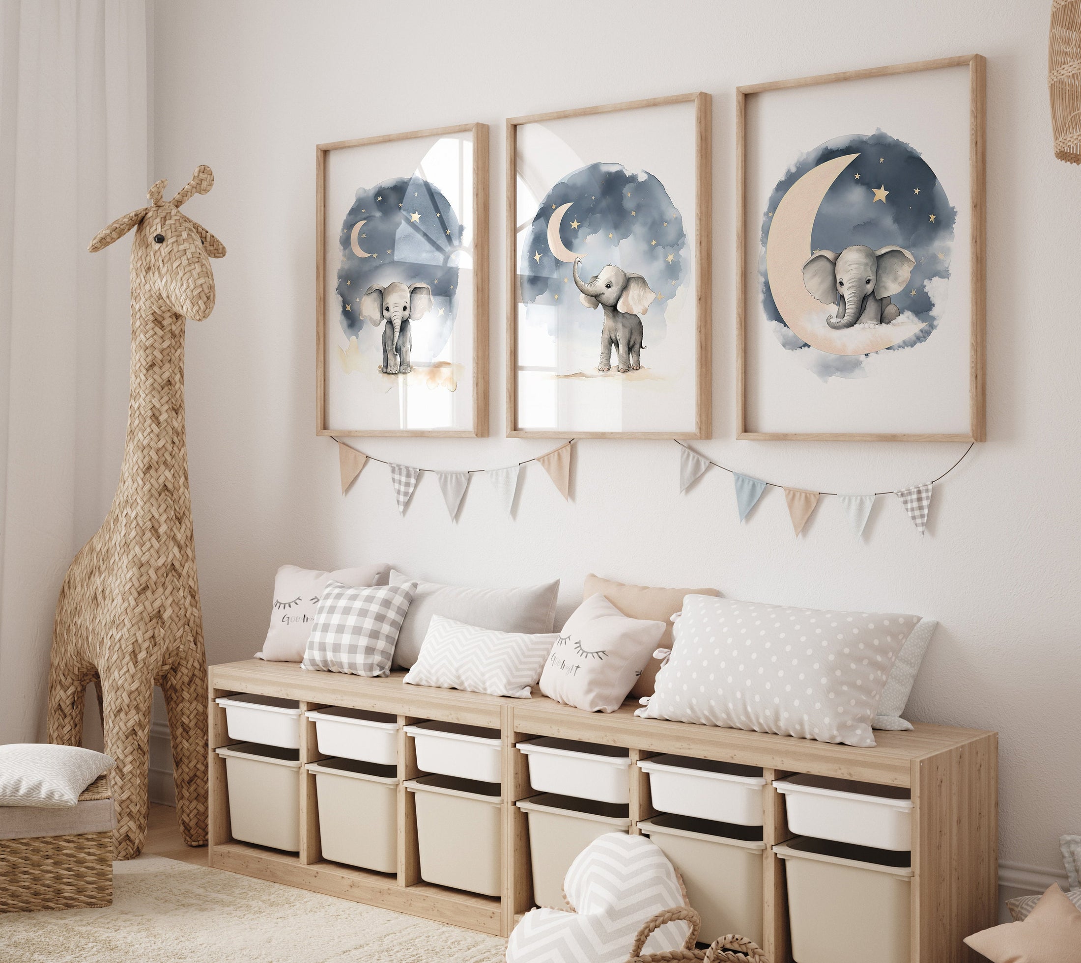 a baby&#39;s room with a stuffed giraffe and other items