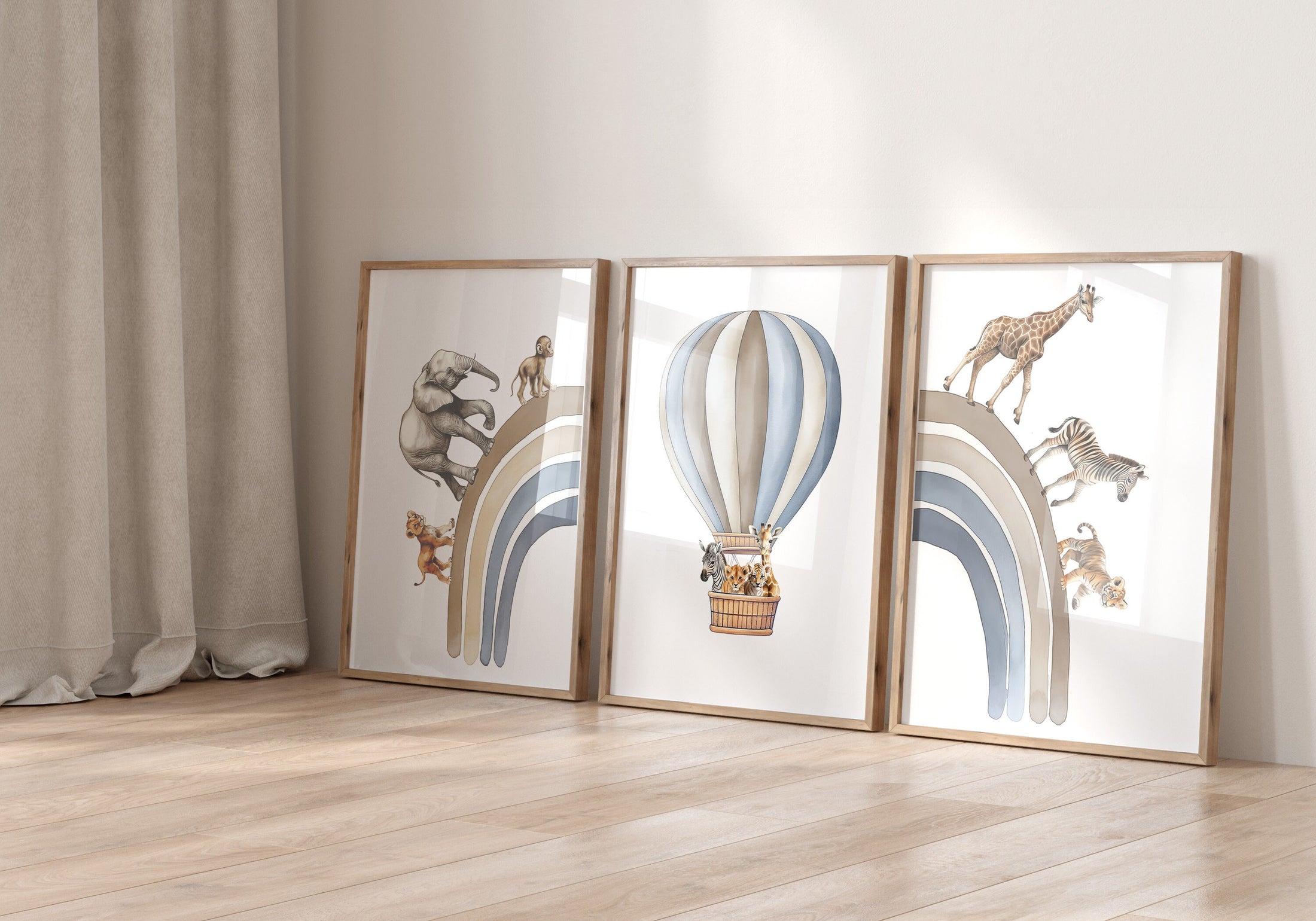 three framed pictures of hot air balloons and giraffes