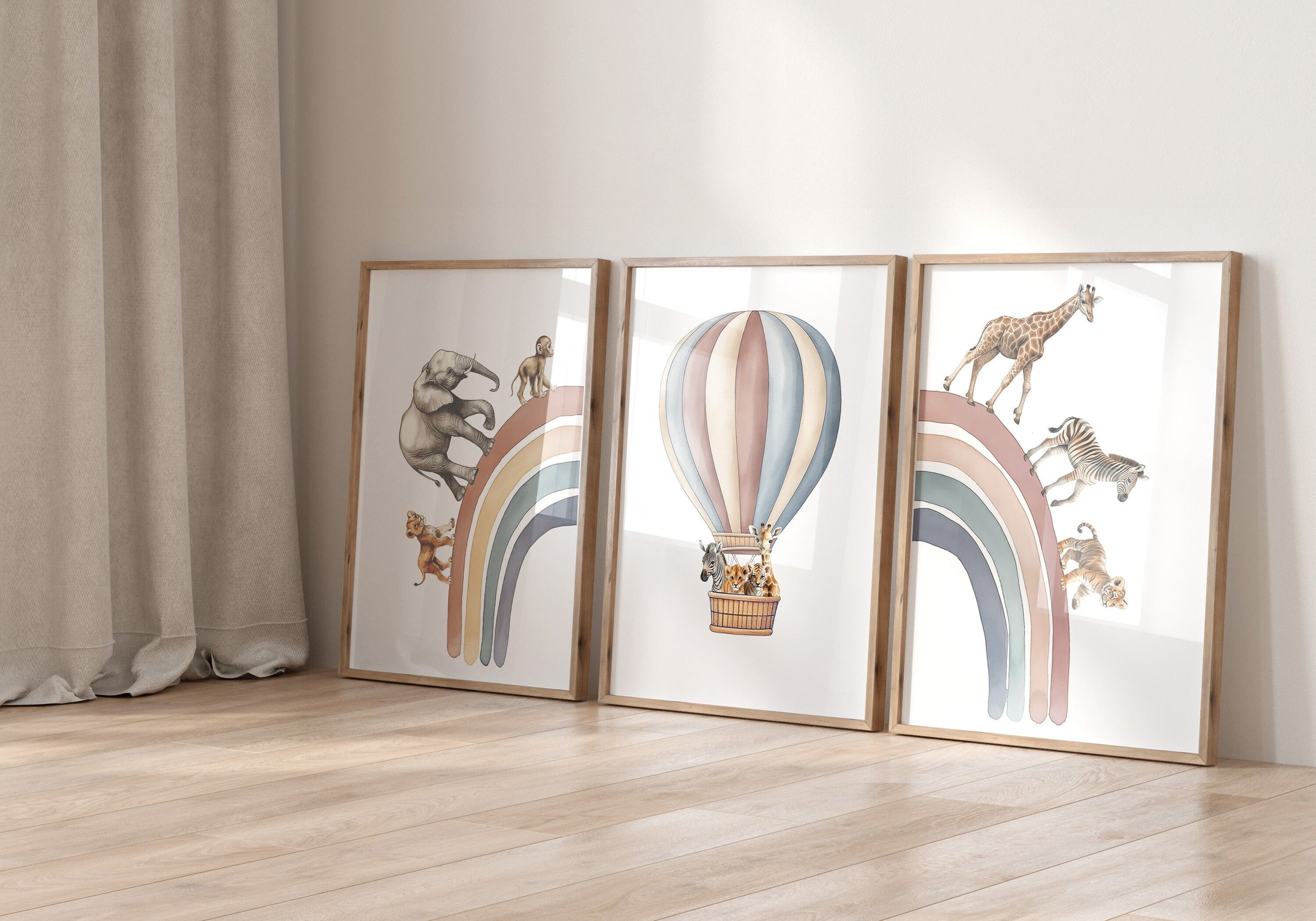 three framed pictures of hot air balloons and giraffes