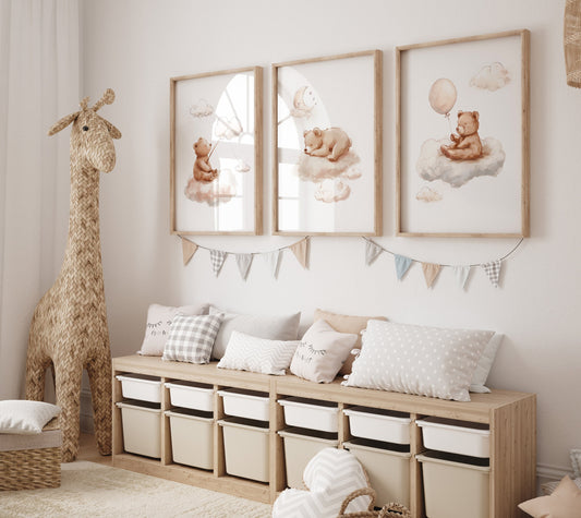 set of three teddy bears.One is sitting on a cloud fishing, one is asleep and the last bear has a balloon.In a beige colourways to suit any baby/child&#39;s bedroom or nursery