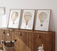 Load image into Gallery viewer, Set of 3 Hot Air Balloon Prints for Nursery | Pastel Colours | Bunny, Goose, Bear - RoseRowanDesign
