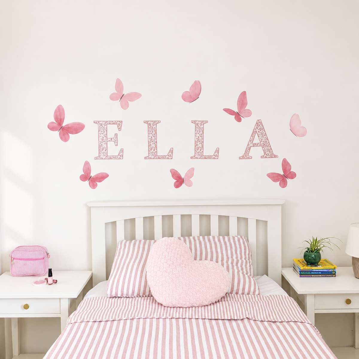 Full display of pink floral name letters and coordinating butterfly wall stickers