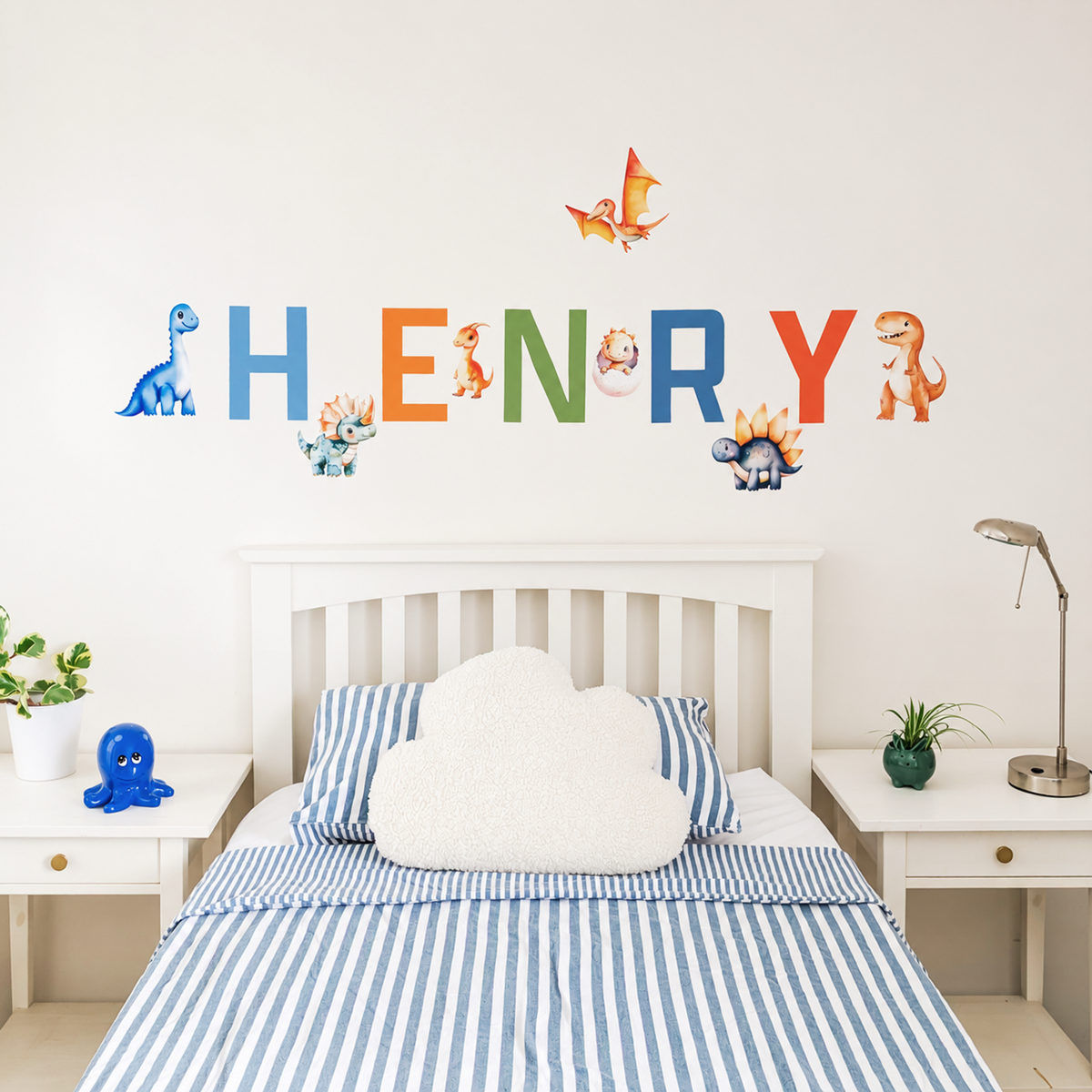 Full display of personalised name fabric wall stickers featuring colourful letters and dinosaurs
