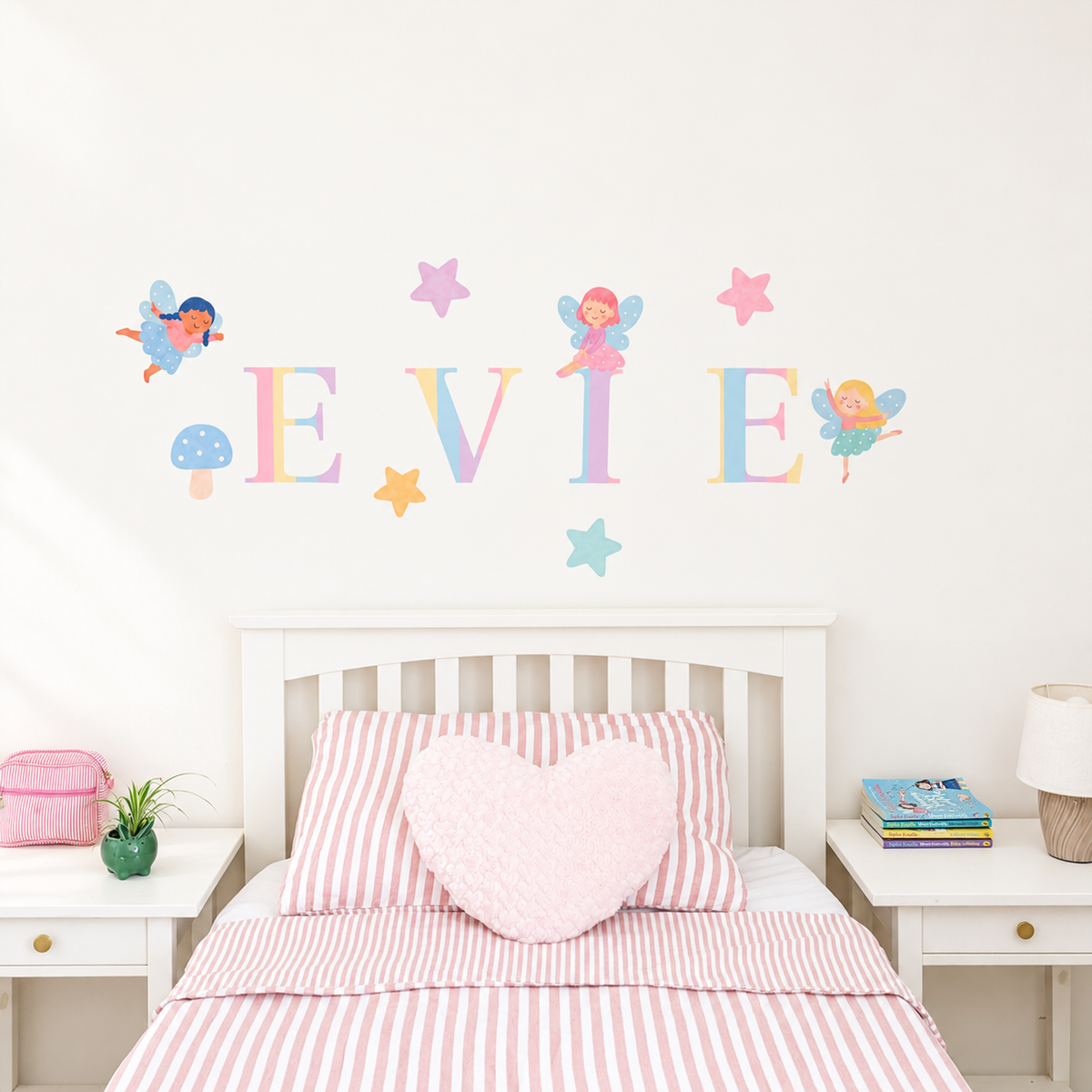 Full display of personalised name fabric wall stickers featuring pastel letters with fairies, stars and toadstools