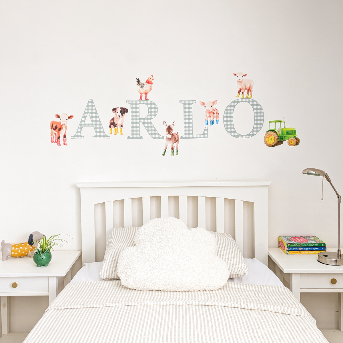 Full display of personalised name fabric wall stickers featuring green gingham letters with farm animals and a tractor