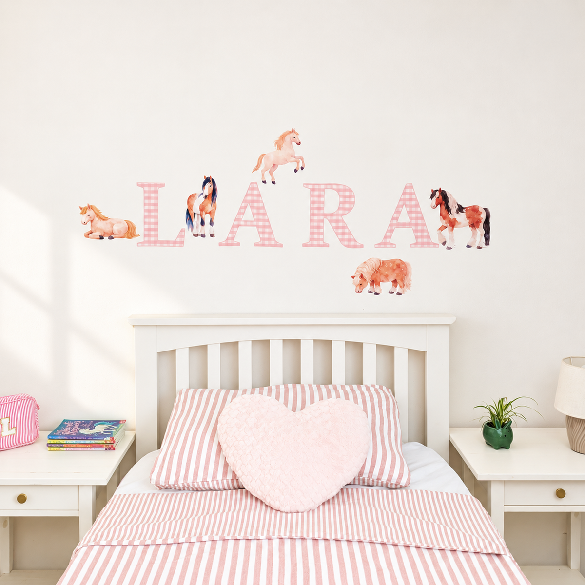 Full display of personalised name fabric wall stickers featuring pink patterned letters and watercolour horses