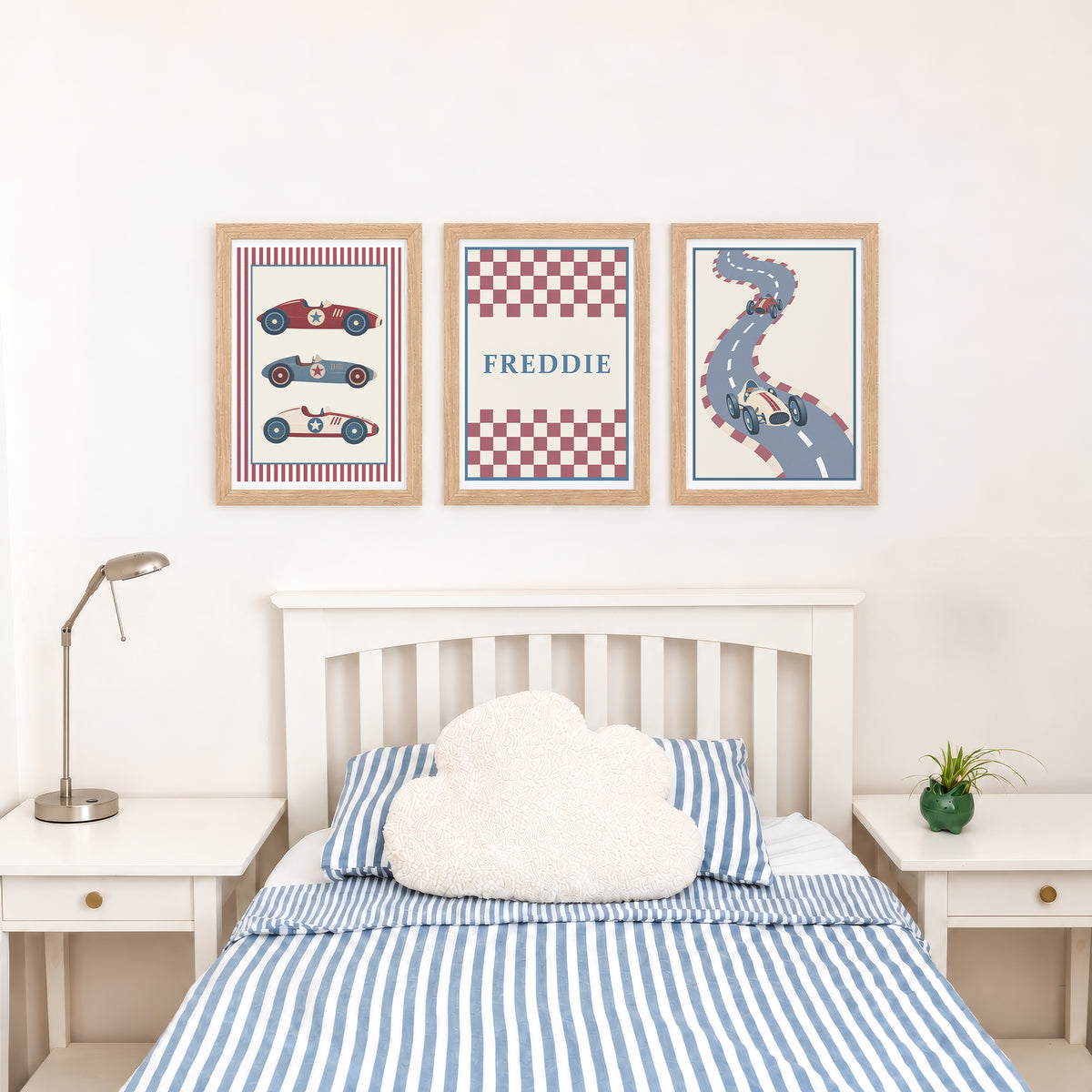 Set of three prints showing racing cars, checkerboard name print and winding race track, bedroom display