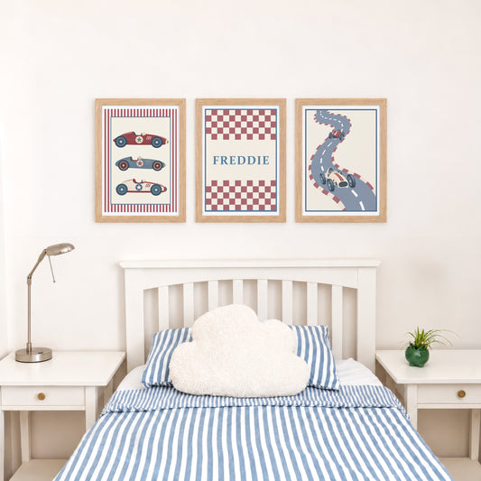 Set of three prints showing racing cars, checkerboard name print and winding race track, bedroom display