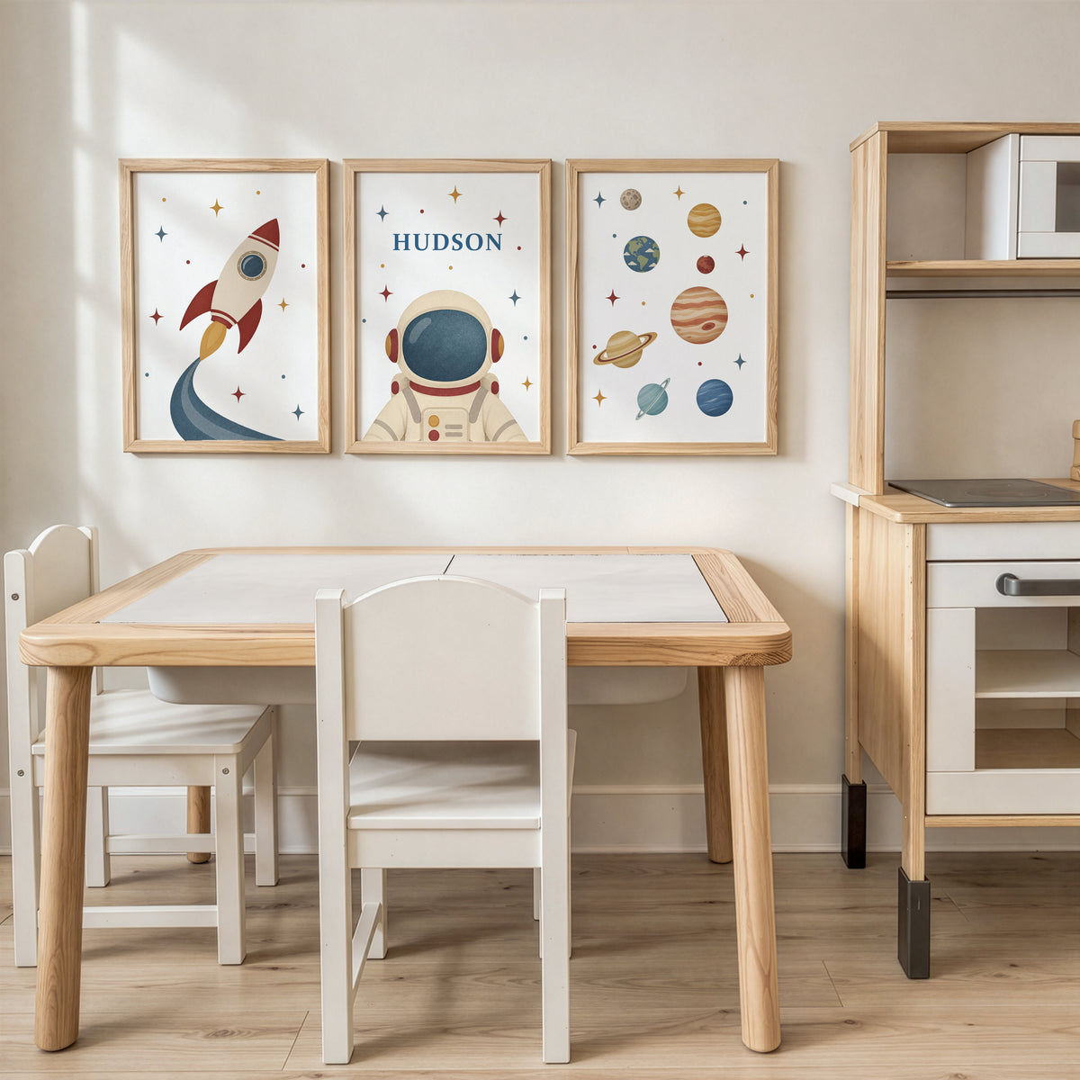 Set of three retro space prints showing rocket, personalised astronaut and planets, playroom display