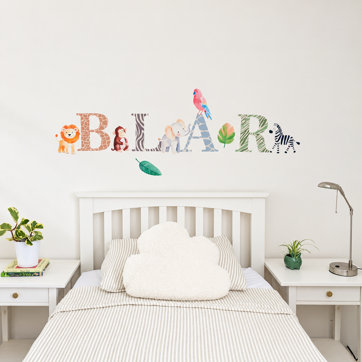 Full display of personalised name fabric wall stickers featuring animal-pattern letters and safari animals