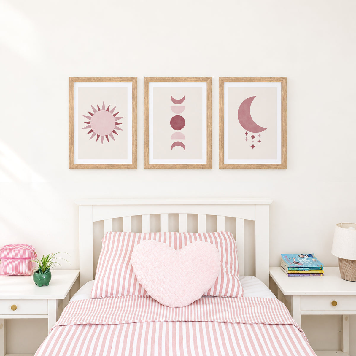 Set of three prints showing rose red sun, moon phases and crescent moon with stars, bedroom display