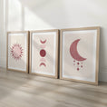 Load image into Gallery viewer, Set of three prints showing rose red sun, moon phases and crescent moon with stars, oak frames display

