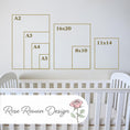 Load image into Gallery viewer, a white crib with a rose drawn on it
