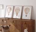 Load image into Gallery viewer, Set of 3 Hot Air Balloon Prints for Nursery | Pastel Colours | Bunny, Goose, Bear - RoseRowanDesign - 
