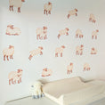 Load image into Gallery viewer, Sheep fabric wall stickers arranged around a nursery changing table
