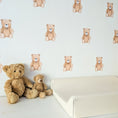 Load image into Gallery viewer, Mini teddy bear wall stickers beside a changing mat and teddy toys
